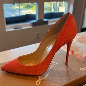 Orange suede louboutins